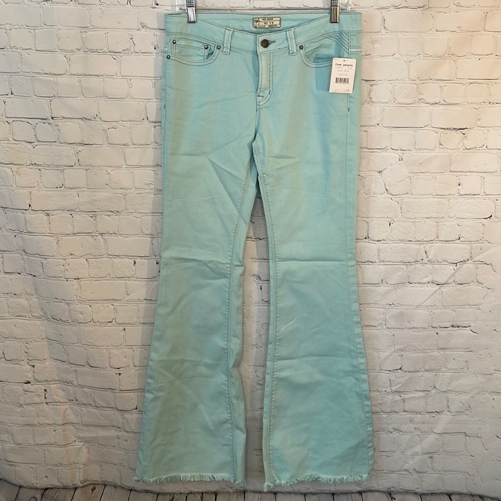 NWT Free People Pale Blue aqua flare denim pants with distressing at bot…